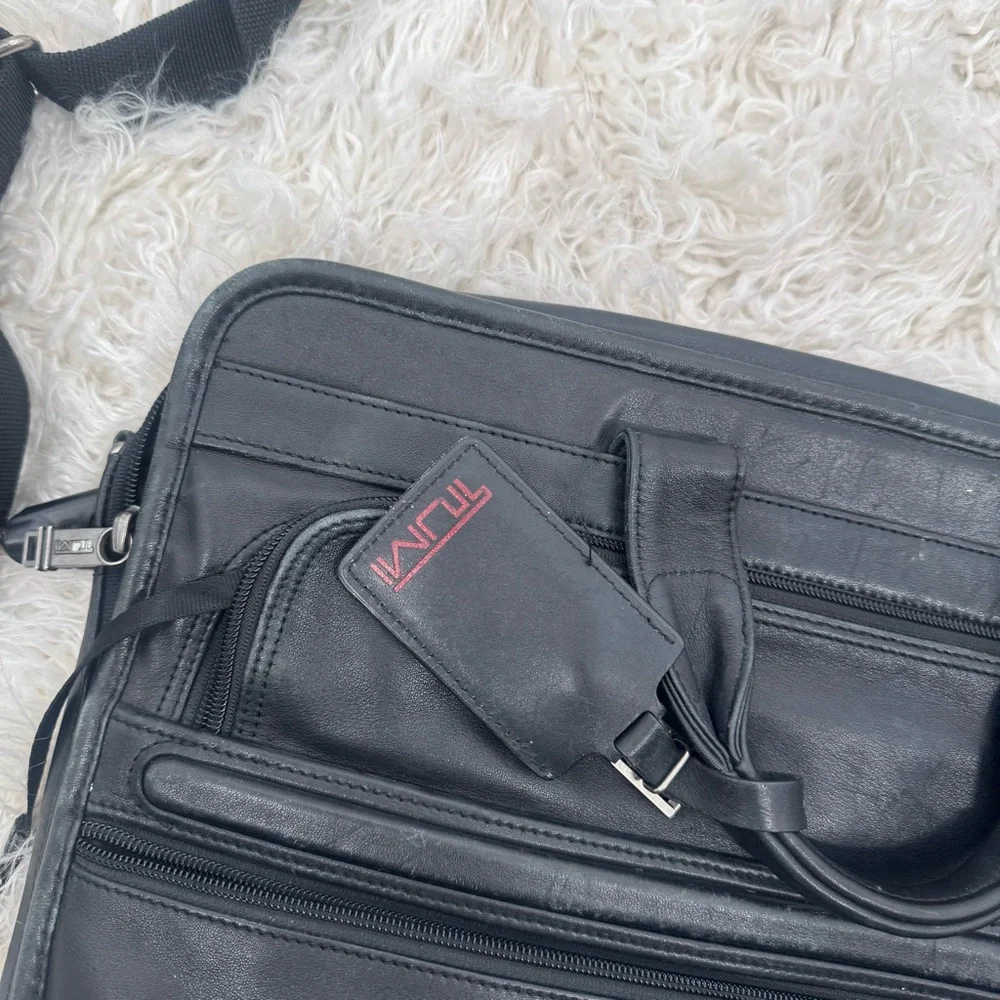 Tumi Black Leather Briefcase with Expandable Pouches Compartments